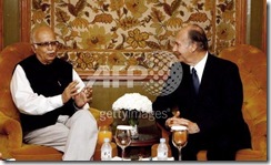 Indian Leader of the Opposition in Lok Sabha (Lower house of parliament) L K Advani (L) gestures as he talks with Imam (Spiritual Leader) of the Shia Imami Ismaili Muslims, the Aga Khan (R) during a meeting at the Presidential Palace in New Delhi on May 13 