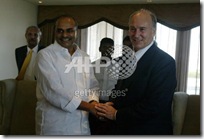 Imam (spirtual leader) of the Shia Imami Ismaili muslims, the Aga Khan (R) greets with the Chief Minister of Andhra Pradesh Rajashekar Reddy 