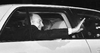 The Aga Khan, leader of the world`s 15 million Ismaili Muslims, waves as he arrives at the Pan Pacific Hotel in Vancouver Monday night. Photograph by Stuart Davis, Vancouver Sun