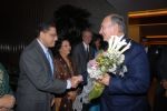 Mawlana Hazar Imam receives flowers and a warm welcome from Jamati leaders upon his arrival in Singapore. Photo Akbar Hakim theismaili.org