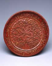 Dish Depicting a Dragon amongst Foliage, China, Ming dynasty, Jiajing era, 1522—1566, Carved cinnabar lacquer on wood, Brooklyn Museum, Gift of Patricia Falk, from the Collection of Pauline B. and Myron S. Falk, Jr., 2003.30 