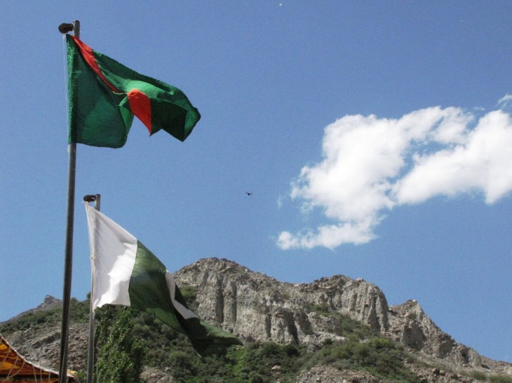 The flying Ismaili and Pakistan flags
