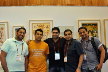 Shamir Allibhai and Hussein Rashid with volunteers from Ismaili community