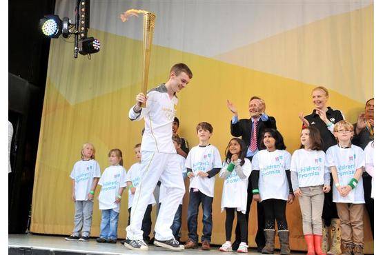 Sara Hirji participates in Torch carrying ceremonies of London Olympics