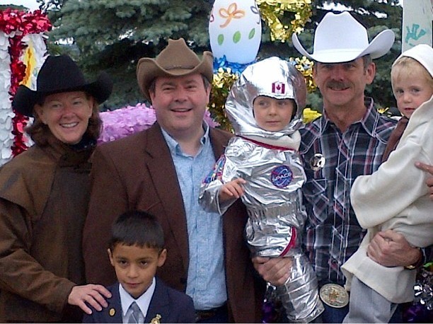 Premier Redford with Astronaut Chris Hadfield, Jason Kenney, Ismaili volunteer kids and the world's cutest astronaut.