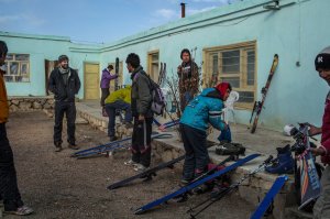 James Robertson of Britain, at left, and Afghans prepared to go skiing last month in Bamian. Credit Mauricio Lima for The New York Times