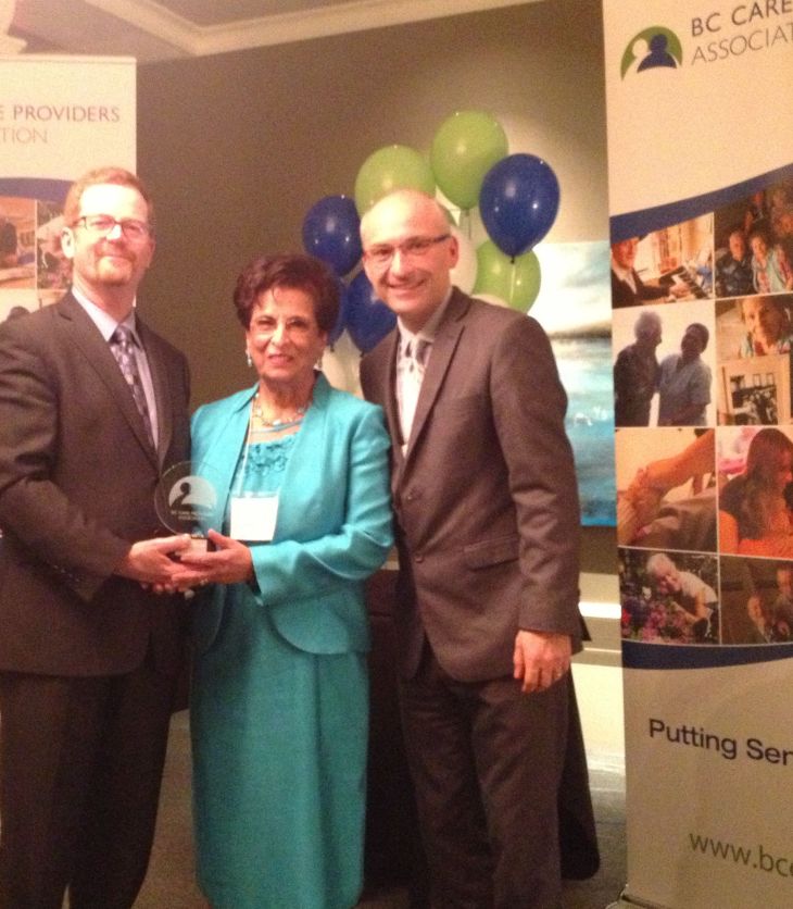Nurjehan Devji presented award by B.C. Health Minister Terry Lake