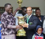 Hon. Prime Minister of Tanzania and Altaf Hirani, holding the Street Child World Cup 2014 Trophy