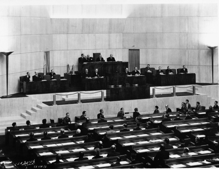 18 Assembly of the League of Nations, showing His Highness Aga Sir Sultan Muhammad Shah, Aga Khan III in the Presidential Chair. Geneva 1937 - Photo League of Nations Archive