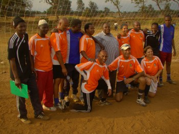 Pictured above are the five IYSC coaches from Canada with their counterpart Tanzania coaches with the Hon. Kilimanjaro Regional Commissioner, Mr. Leonidas Gama (in chequered shirt) – standing in the back row, in the middle.