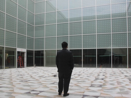 CBC - Museum director Henry Kim takes a personal moment in the courtyard of the museum to admire the view. (Zulekha Nathoo:CBC)