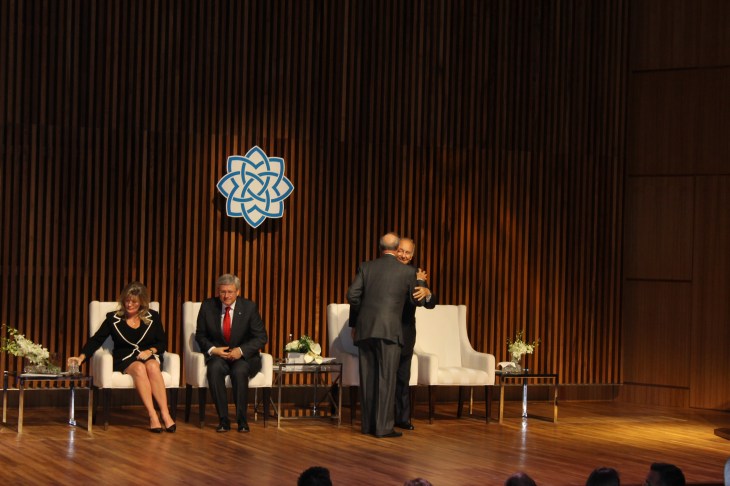 Brotherly affection: Prince Amyn hugs Mowlana Hazar Imam after his address. [Image © Ismailimail/AM]