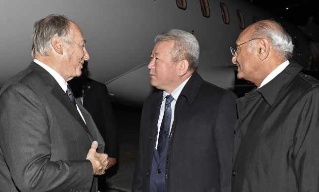 Mawlana Hazar Imam is received by Minister Kanat Sadykov and AKDN Representative Shamsh Kassim-Lakha upon his arrival in Bishkek. (The Ismaili - AKDN / GARY OTTE)