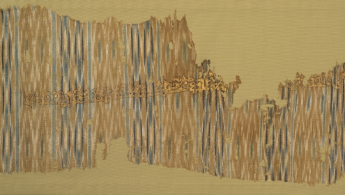 ROM - Ikat shawl with painted inscription Cotton tabby with warp ikat pattern, ink, gold leaf Yemen 10th century 970.364.19