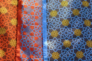 Beautiful scarves and ties in the museum shop feature the Aga Khan Museum logo symbol. (Image: Examiner/Lesley Peterson) 