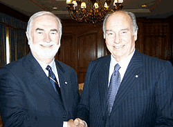 McMaster University President Peter George talks with His Highness the Aga Khan at the signing ceremony for a new memorandum of agreement between McMaster and the Aga Khan University. Photo by Susan Emigh/Daily News