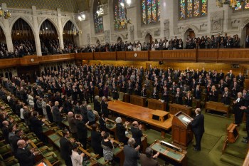 Ottawa, Canada. February 27, 2014 :The floor and galleries of the House of Commons Chamber rise in applause for His Late Highness Prince Karim Aga Khan following his address to both Houses of the Parliament of Canada. Image credit: TheIsmaili / Zahur Ramji