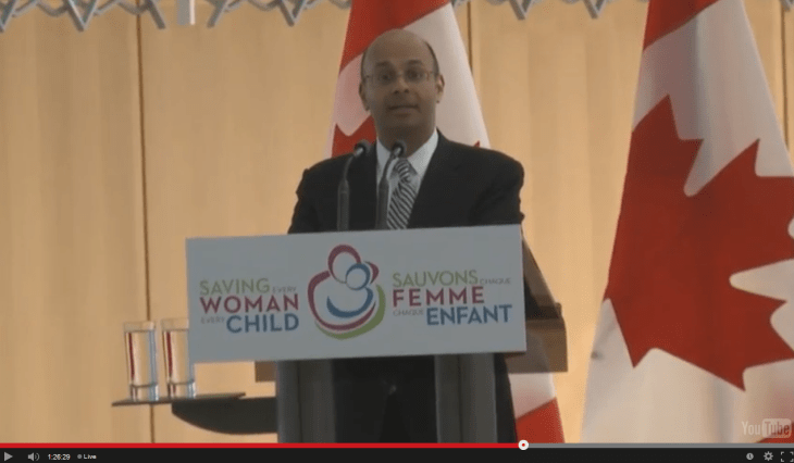 Aga Khan Foundation Canada's CEO Khalil Shariff welcomes Prime Minister Stephen Harper, Bill Gates and Susan Johnson to the Delegation of Ismaili Imamat (Image screen capture of live webcast)