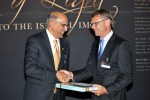 President Azeem Chunara presents a gift to Minister Paul Goldsmith, who was Chief Guest at the opening of the RAYS OF LIGHT exhibition in Auckland. (Photo: Ismaili Council for ANZ via TheIsmaili.org)