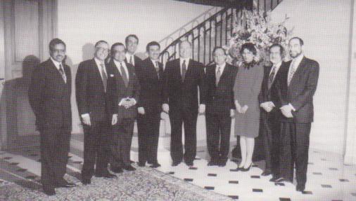 February 25, 1992: His Highness the Aga Khan, 49th Shia Ismaili Imam, pictured with members of the US Aga Khan Foundation National Committee (1989-1992) at his residence on the occasion of the Aga Khan Foundation's 25th anniversary. From left to right: Tajdin Mitha, Shahbudin Rahimtoola, Habibullah Jamal (President, US Aga Khan Council), Iqbal Paroo, Zulfikar Esmail (Chairman, AKF, USA), the Aga Khan, Azim Nanji (Vice Chairman), Fariyal Ross-Sheriff, Lutaf Dhanidina and Iqbal Noor Ali (then CEO, AKF USA). Photo: The Ismaili, USA.