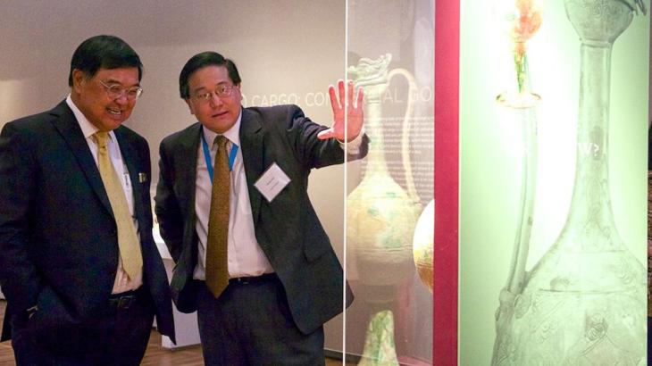 The High Commissioner of Singapore getting an exclusive tour of the Last Dhow exhibition featured at the Aga Khan Museum for a limited time .  The High Commissioner of Singapore (l) is seen here with Dr Henry Kim (r), Director and CEO of the museum.