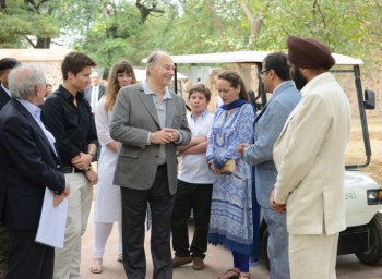 Mawlana Hazar Imam speaking with AKTC staff after touring the Sundar Nursery and Batashewala complex with Prince Aly Muhammad, Princess Zahra and her children, Sara and Iliyan. (Image credit: AKDN / Narendra Swain via TheIsmaili.org)