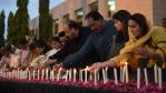 Pakistani legislators light candles during a vigil on May 14, 2015, for the victims following an attack by gunmen on a Shiite Ismaili minority bus in Karachi . (Image credit: ASIF HASSAN/AFP/Getty Images via The Globe and Mail)