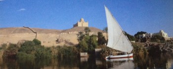 A felucca on the Nile at Aswan, with the mausoleum of Imam Sultan Mahomed Shah and his residence in the background. ((Image: The Ismailis: An Illustrated History)