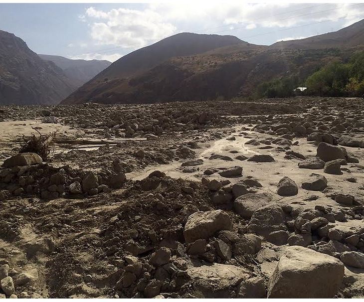 A flash flood carrying tons of mud and debris tore down this valley, washing away the homes and belongings of around 80 families in the Tajik village of Barsem. Abnormal weather patterns, possibly due to climate change, and the dangerous consequences are highlighting how many rural communities are ill-equipped to deal with the climate chaos. (Photo: EurasiaNet)