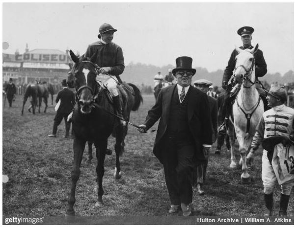 1930: His Highness the Aga Khan III leads in Blenheim after winning the Derby race (w H Wragg) at Epsom. (Photo by P William A. Atkins/Central Press/Getty Images)