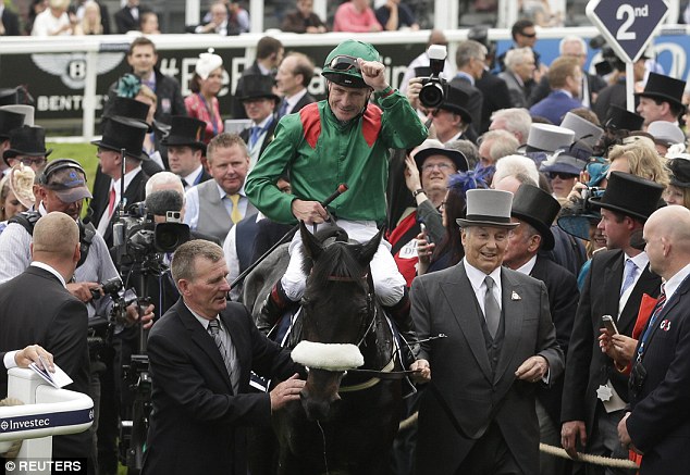 Aga Khan leads his team. Pat Smullen celebrates after riding Harzand to victory in the 4.30 Investec Derby Action Images via Reuters Henry Browne Livepic