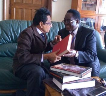 VIVJ with the Makerere Vice Chancellor. Red is his PhD dissertation, Stanford1976
