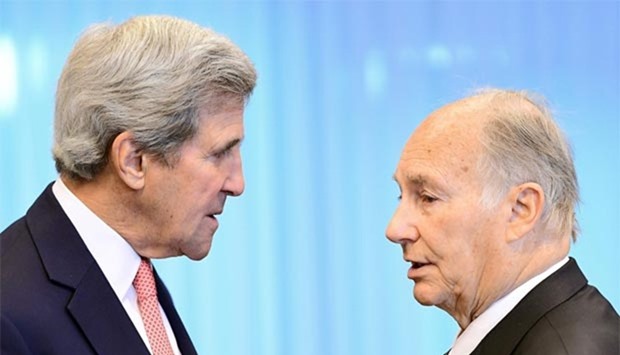 US State Secretary John Kerry speaks with His Highness the Aga Khan (Prince Shah Karim Al Husseini Aga Khan IV) as they attend the Brussels Conference on Afghanistan (image via Gulf Times)
