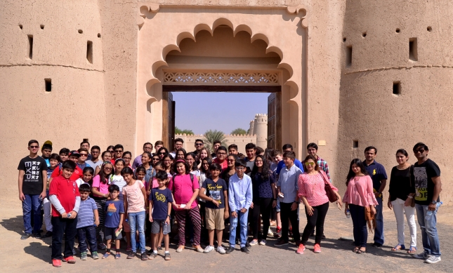 Students pose for a group photo in front of Al Jahili Fort, the venue of the 2016 Aga Khan Award for Architecture ceremony. SHUNEAL SHOUKAT ALI