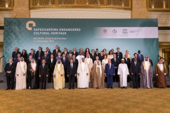 His Highness Prince Karim Aga Khan (1st down left) and French President Francois Hollande (6th down left), pose for a photo between Sheikh Mohammed bin Zayed al-Nahyan, Crown Prince of Abu Dhabi and UAE's deputy commander-in-chief of the armed forces, on his right, and Sheikh Mohammed bin Rashid al-Maktoum, UAE prime minister and ruler of Dubai with the other head of states and dignitaries during the Safeguarding Endangered Cultural Heritage Conference at Emirates Palace in Abu Dhabi, United Arab Emirates. (Image credit: Emirates News Agency via AP)
