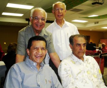 Standing, left, Amir Hameer, Abdul Jaffer. Seated Sultan Jessa, left, Anver Talib at a social gathering