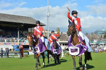 The US team celebrate winning the Aga Khan Trophy in the FEI Nations Cup, at the RDS in Dublin. (Image credit: Alan Betson via The Irish Times)