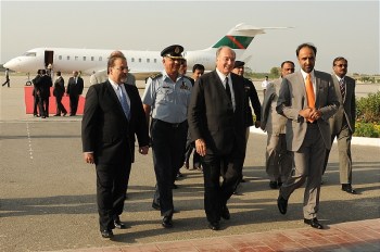 October 13, 2009: Interim Governor of Gilgit-Baltistan Qamar Zaman Kaira and The Aga Khan National Council President Iqbal Waljee receieve Prince Aga Khan on his arrival at the Benazir Bhutto International Airport on Tuesday (dated)