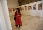 A woman looks at art exhibition at Babur Garden in Kabul, Afghanistan March 31, 2018. Picture taken March 31, 2018. REUTERS/Mohammad Ismail