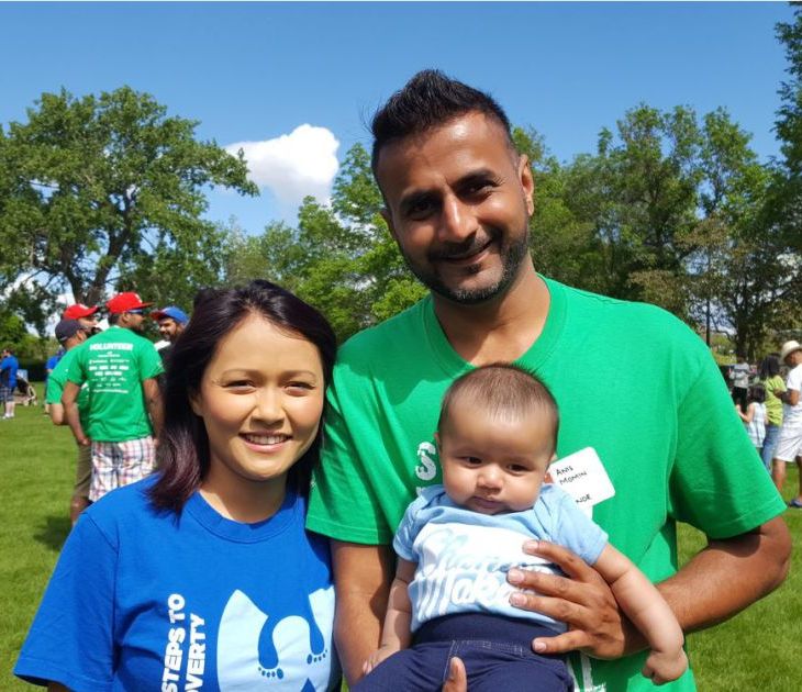 Anis Momin, the main organizer of the World Partnership Walk in Regina, stands with his wife Nadia Akbar Kamal and their three-month-old daughter the morning of the walk at Wascana Centre. As a family, they have raised $1,500 to help end global poverty. LYNN GIESBRECHT / REGINA LEADER-POST