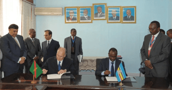 Arusha, Tanzania. July 18, 2012: His Highness Prince Karim Aga Khan IV and Ambassador Richard Sezibera, Secretary General of the East African Community, sign an agreement between the AKDN and the EAC to broaden cooperation in the areas of economic, social and cultural development throughout East Africa. Image credit: AKDN / Zahur Ramji