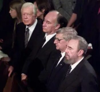 Montreal, Canada. October 3, 2000: (L-R) Late US President, Jimmy Carter, 49th Ismaili Imam, His Late Highness Prince Karim Aga Khan, Late Canadian Governor General, Romeo Le-Blanc, and Late Cuban President Fidel Castro attend the state funeral for former Canadian Prime Minister Pierre Trudeau. At the state funeral, Presidents Jimmy Carter and Fidel Castro together with His Highness Prince Karim Aga Khan IV were 3 of the 5 honorary pallbearers. Image credit: Simerg-Barakah