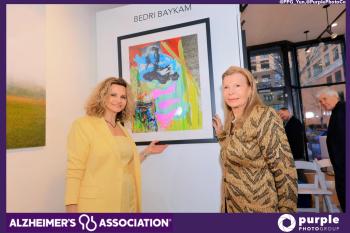 Chicago, Illinois, USA – April 4, 2024: Arica Hilton and Princess Yasmin Aga Khan next to the art piece by BEDRI BAYKAM - HOMAGE TO RITA. Image credit: Alzheimer’s Association